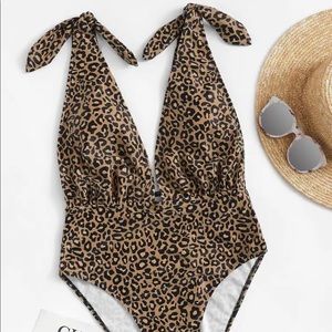 Plunging neck leopard high leg one piece
